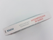 Buchcover und Innenansicht für das Buch: Katzenpfötchen im Schnee
