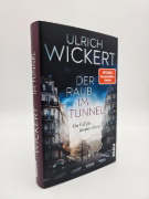 Buchcover und Innenansicht für das Buch: Der Raub im Tunnel